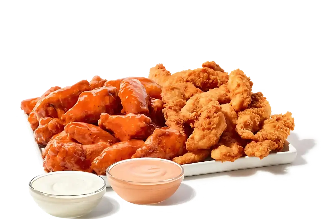 Platter with chicken fingers, traditional wings, fries, and coleslaw with dipping sauces