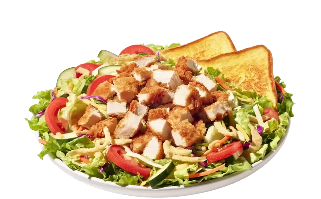 House Zalad with fried chicken, mixed greens, tomatoes, cucumbers, and shredded cheese"