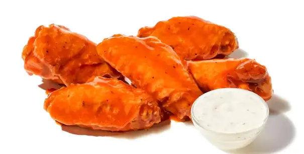 Crispy fried traditional bone-in chicken wings tossed in sauce